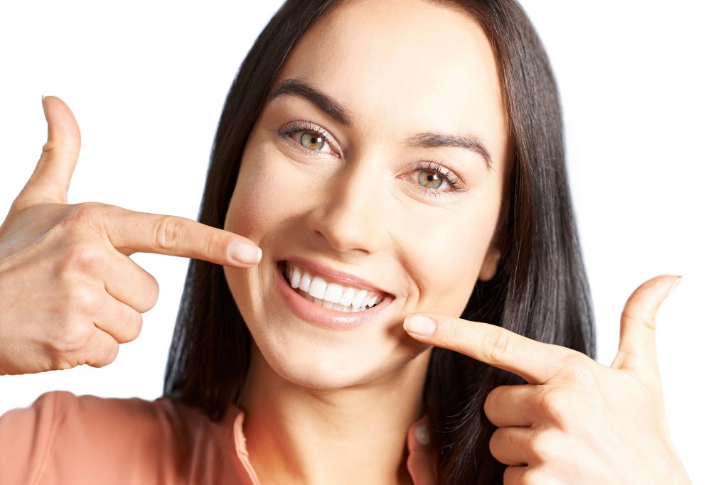 patient with new dental implants